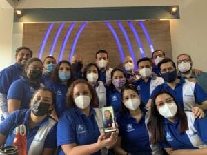 GLS20 Attendees and volunteers pose with masks in Guatemala